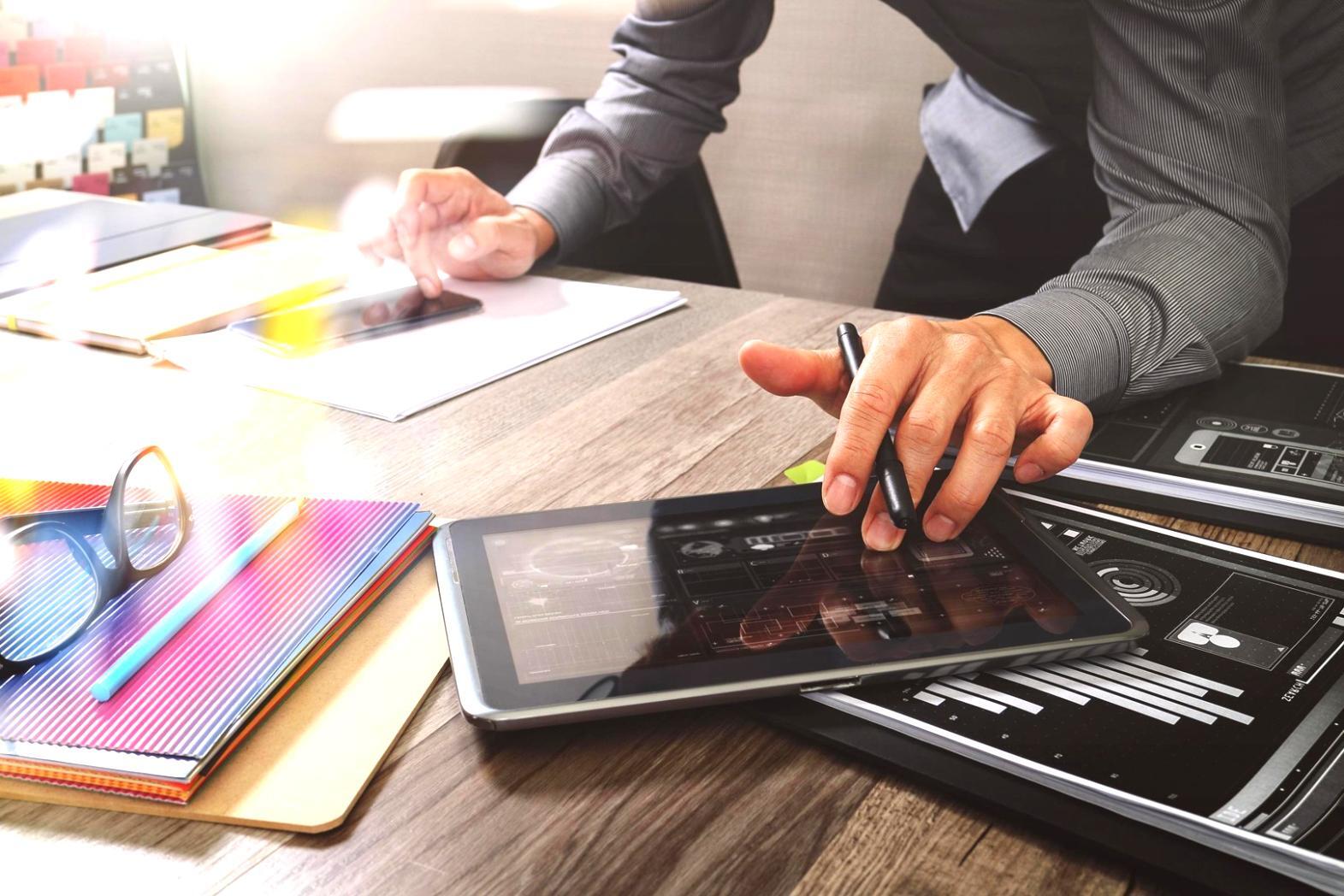 Design team collaborating on mobile interface layouts